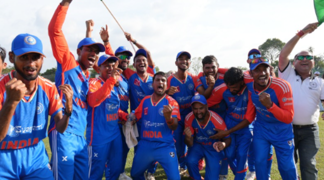 Cricket players celebrating together